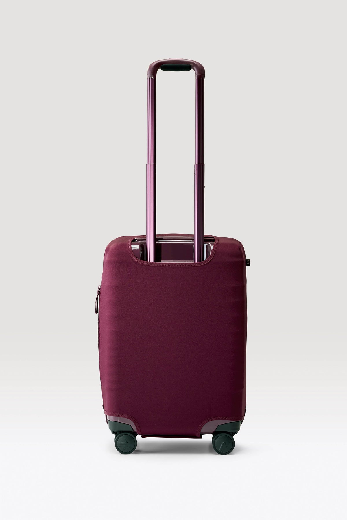 The Carry-On Luggage Cover in Plum