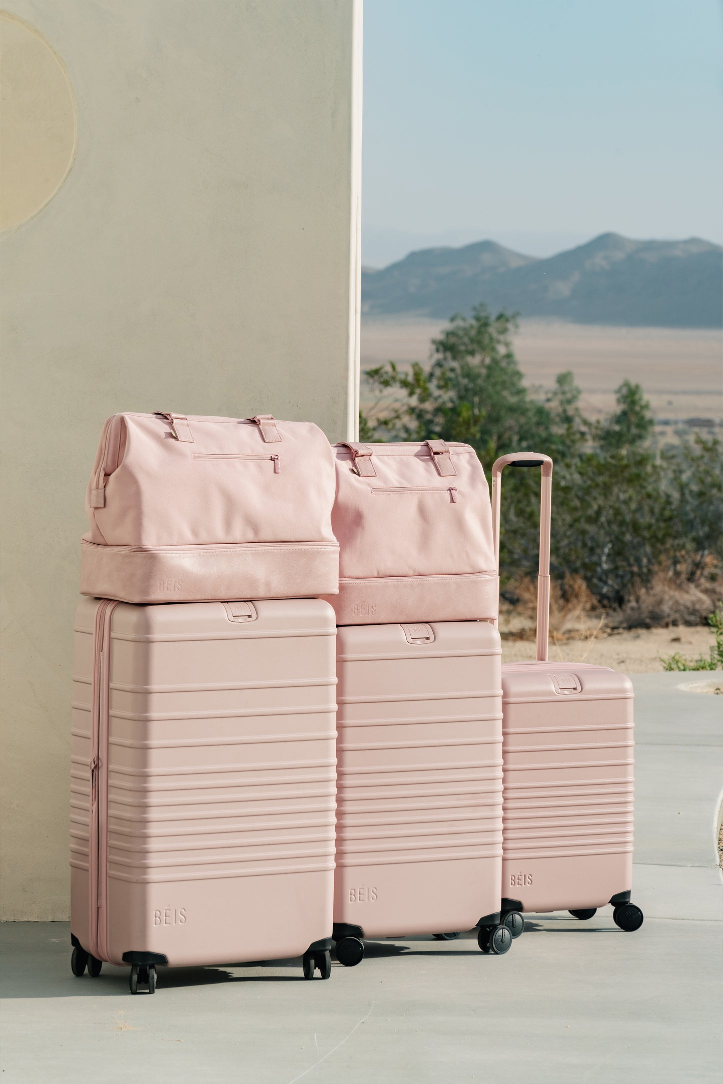 The 26" Check-In Roller in Atlas Pink