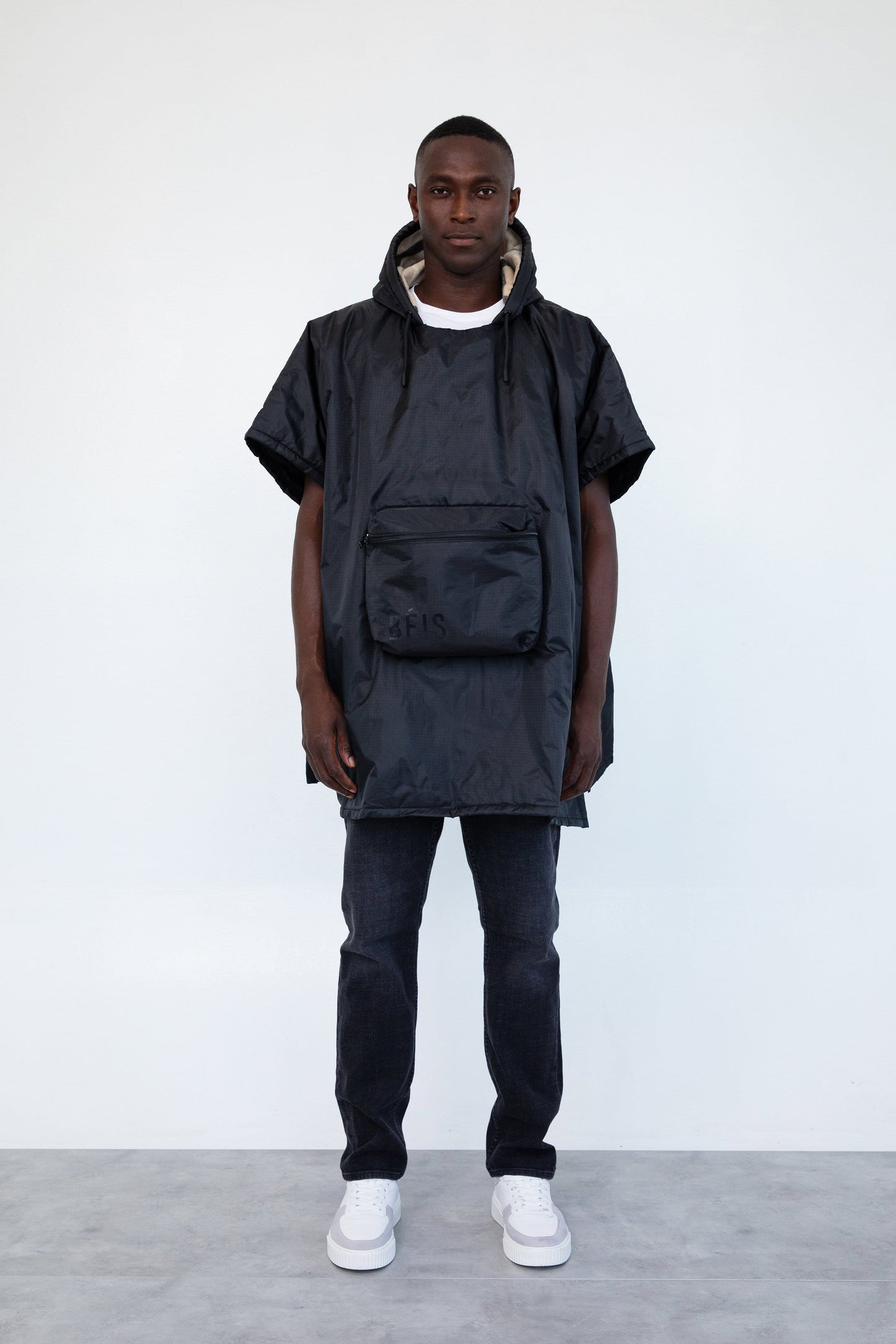 Packable Poncho Black Front Model Unisex