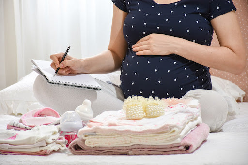 Mum to be preparing bag for the delivery day