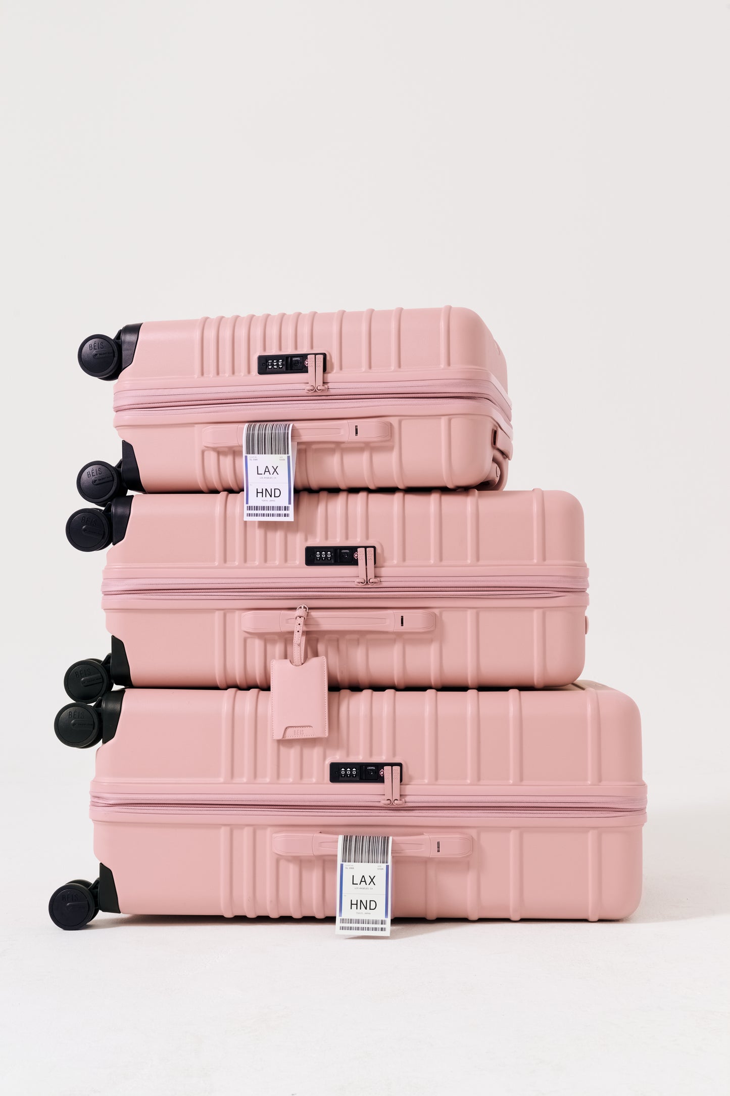 The Large Check-In Roller in Atlas Pink