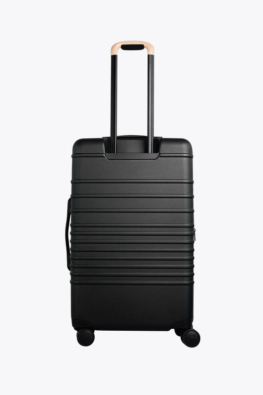 Resale The Medium Check-In Roller in Black