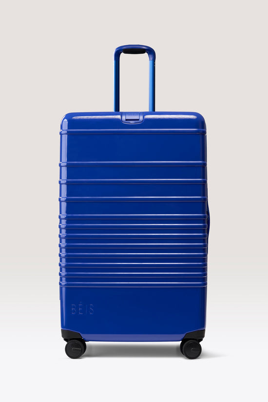 The Large Check-In Roller in Glossy Cobalt Blue