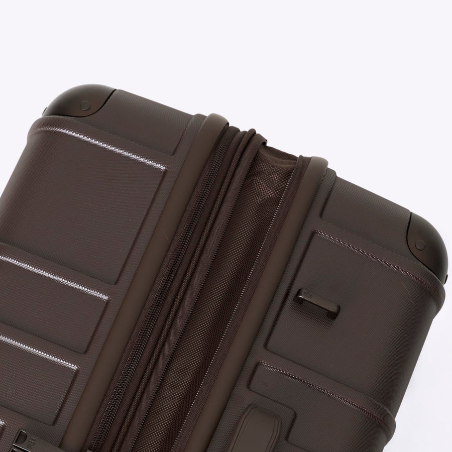 Brown suitcase on a white background