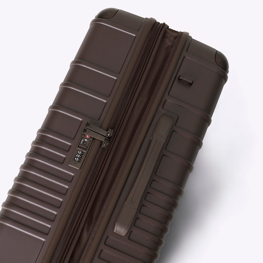Brown suitcase on a white background
