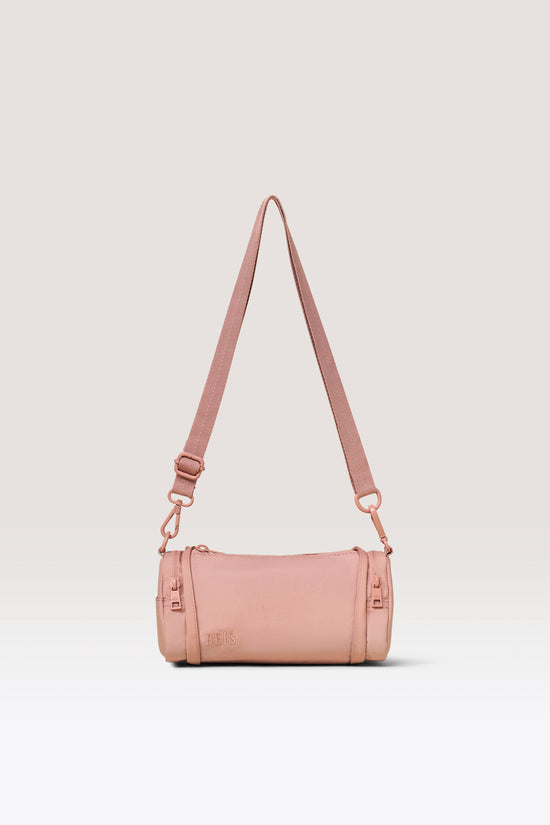 The Expandable Crossbody Charm in Atlas Pink