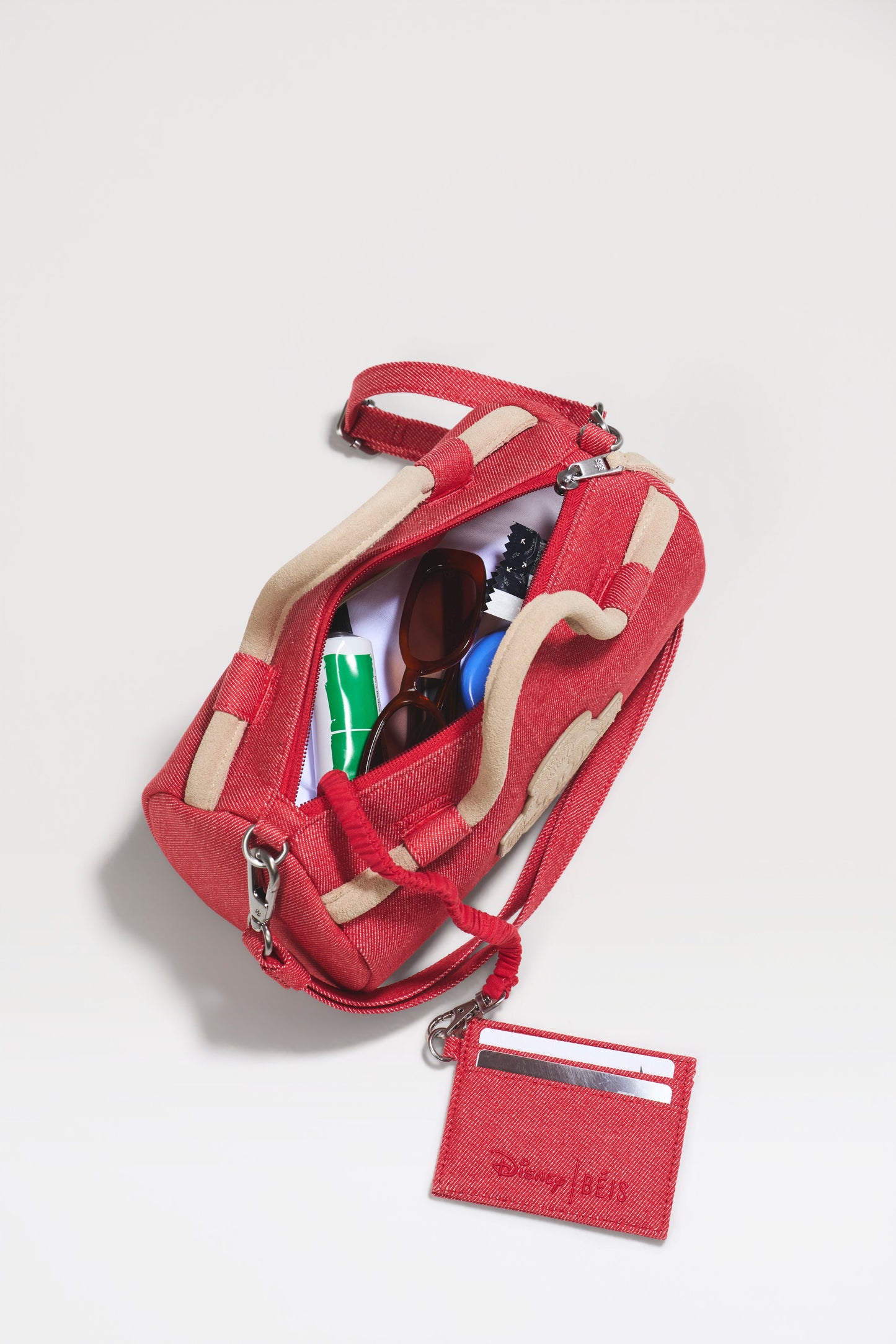The Disney Small Duffle in Red Jeans