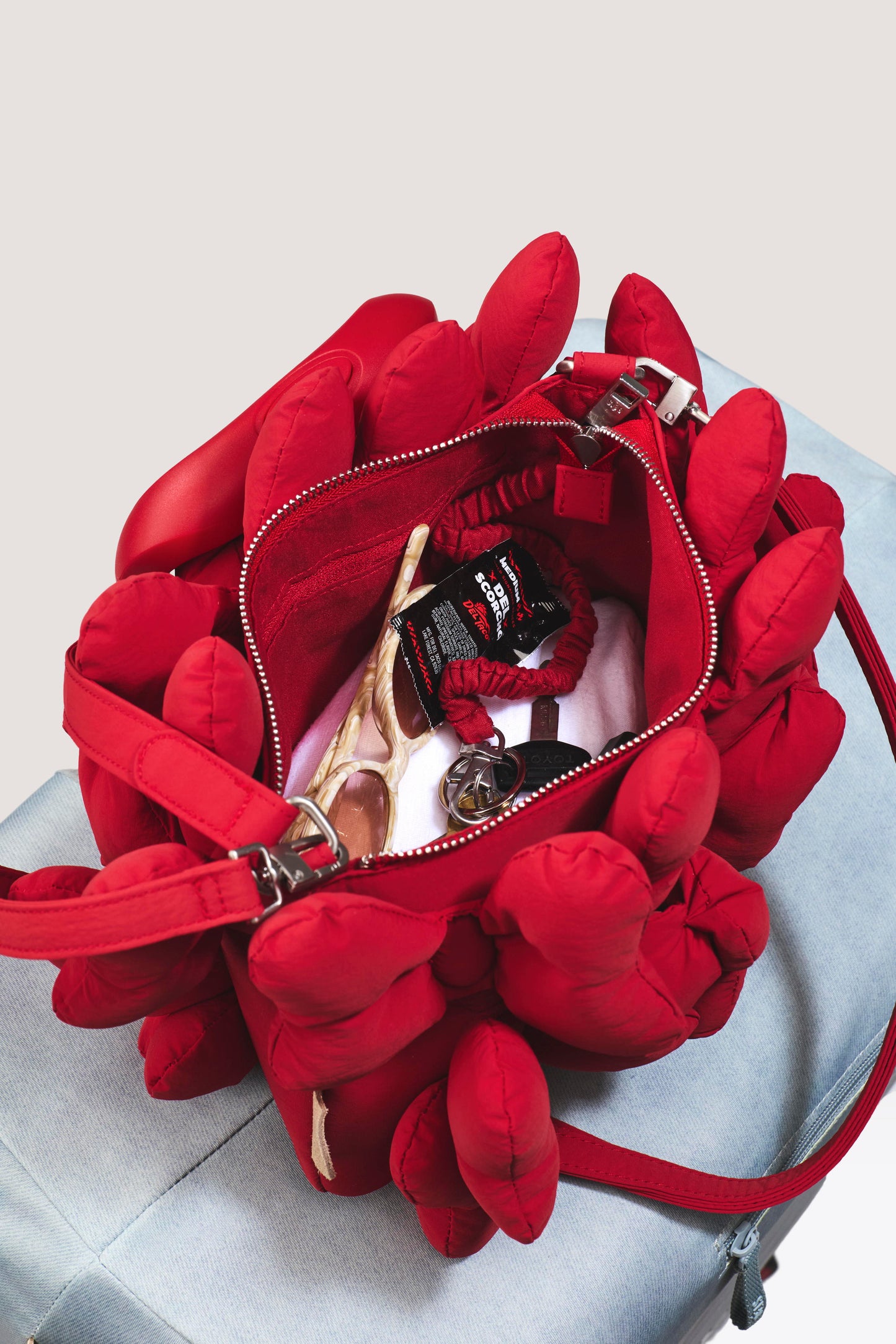 The Minnie Bow Handbag in Mickey Mouse Red