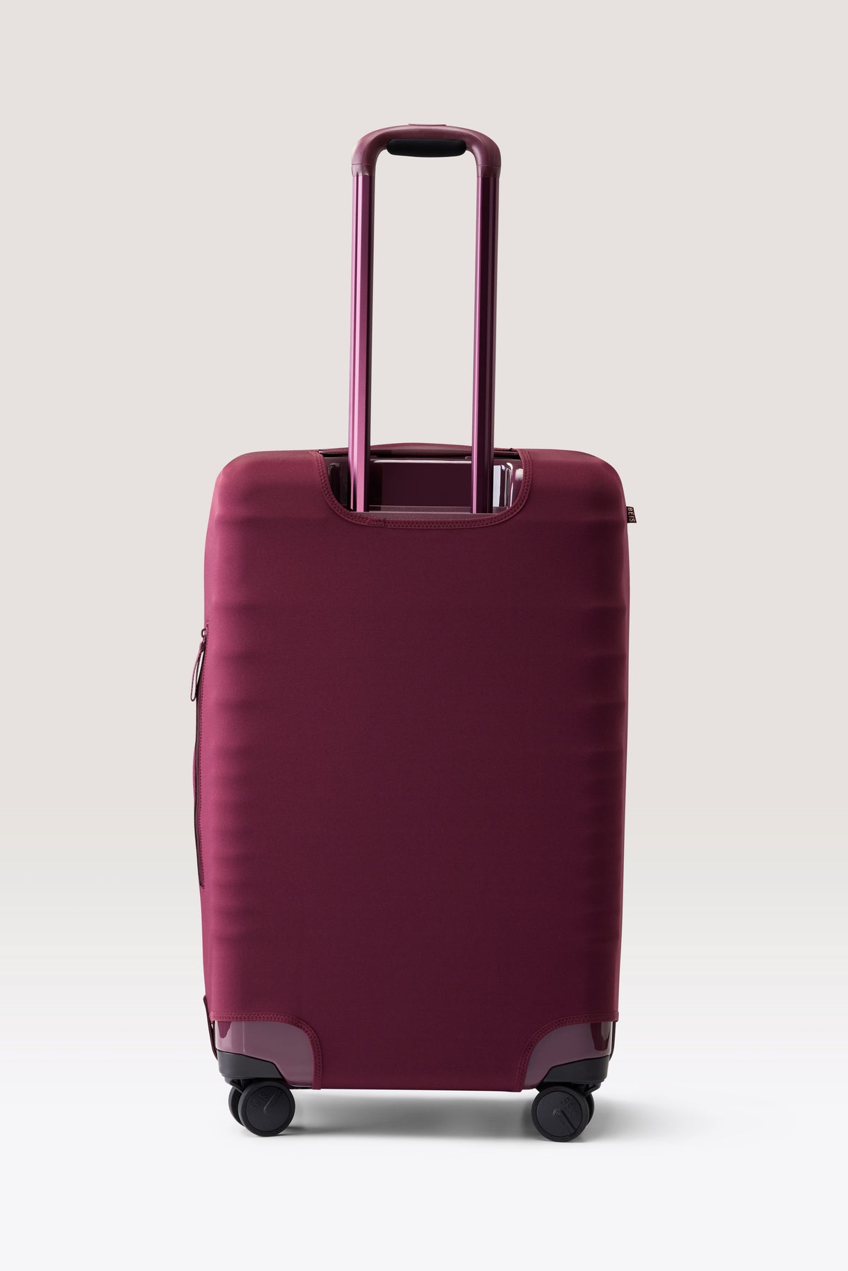 The Medium Check-In Luggage Cover in Plum