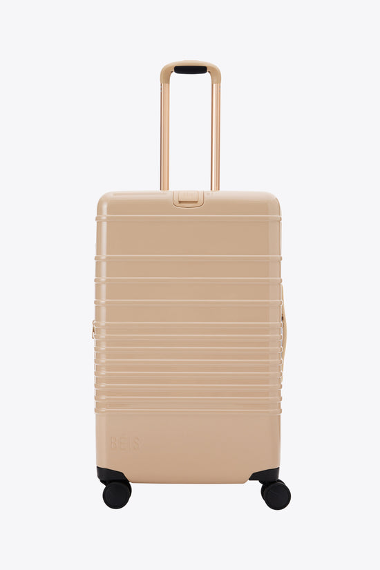 The Medium Check-In Roller in Glossy Beige