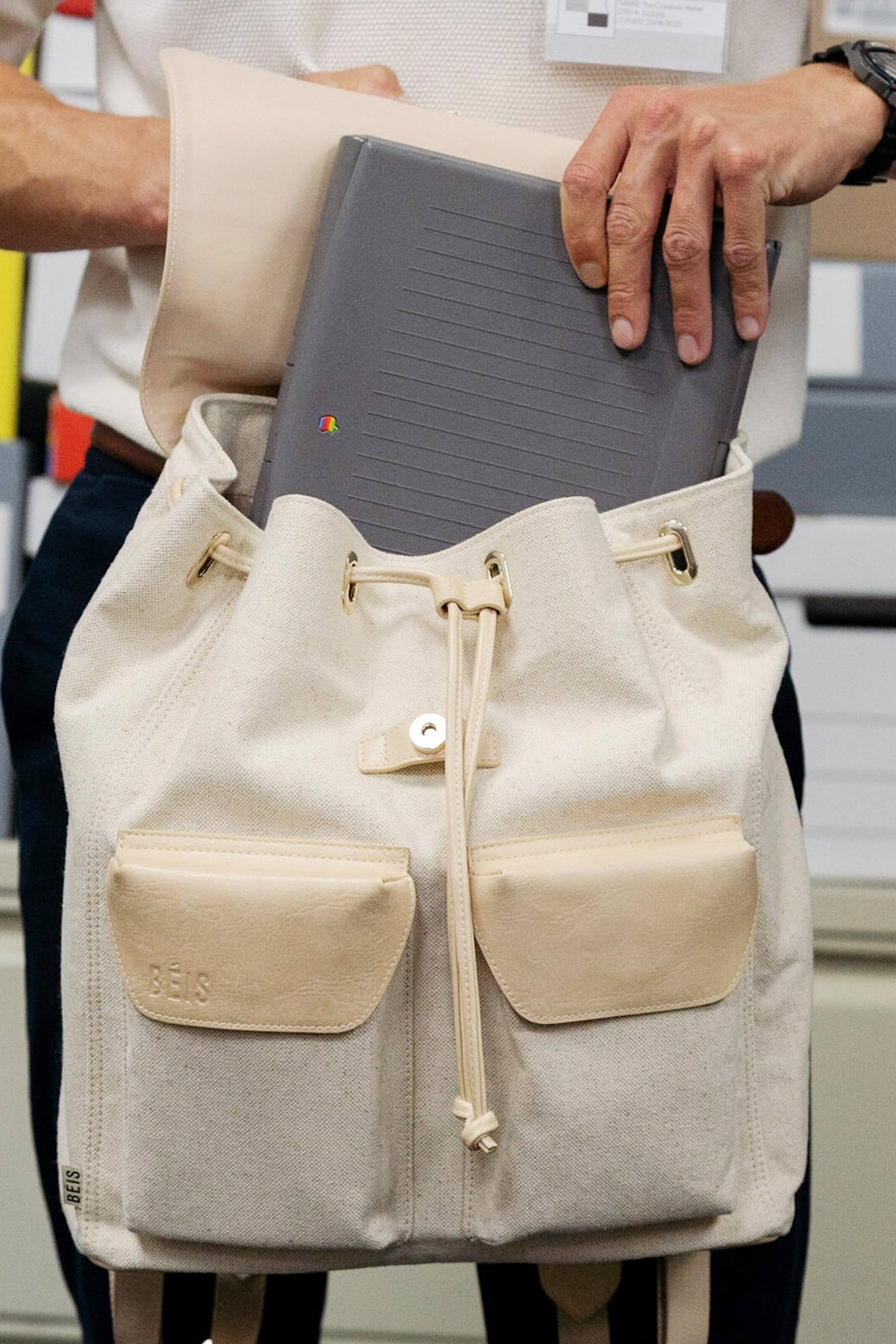 Rucksack in Beige Front with Retro Apple Laptop in Office
