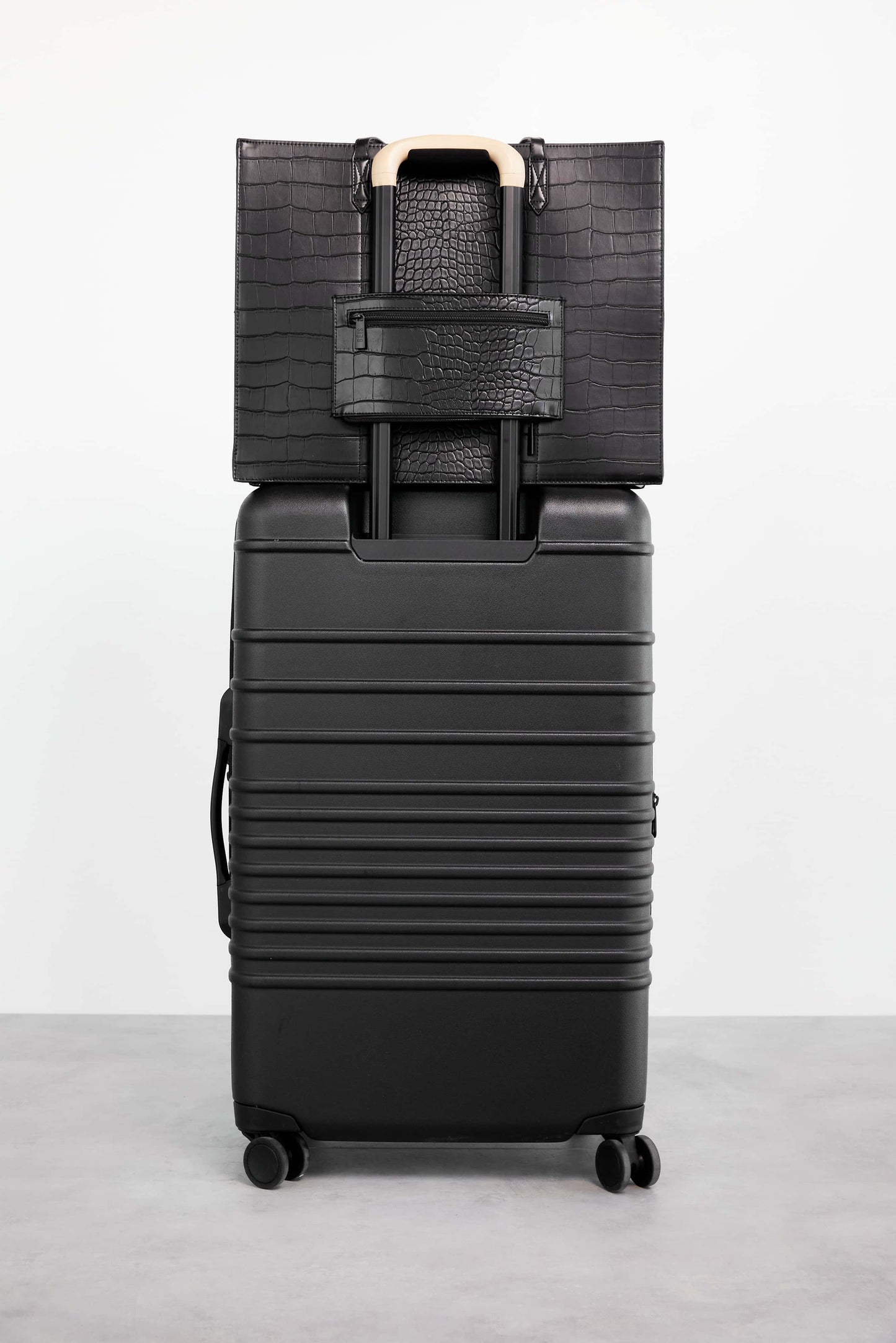 Work Tote Black Croc Back Trolley Sleeve Stacked on Roller