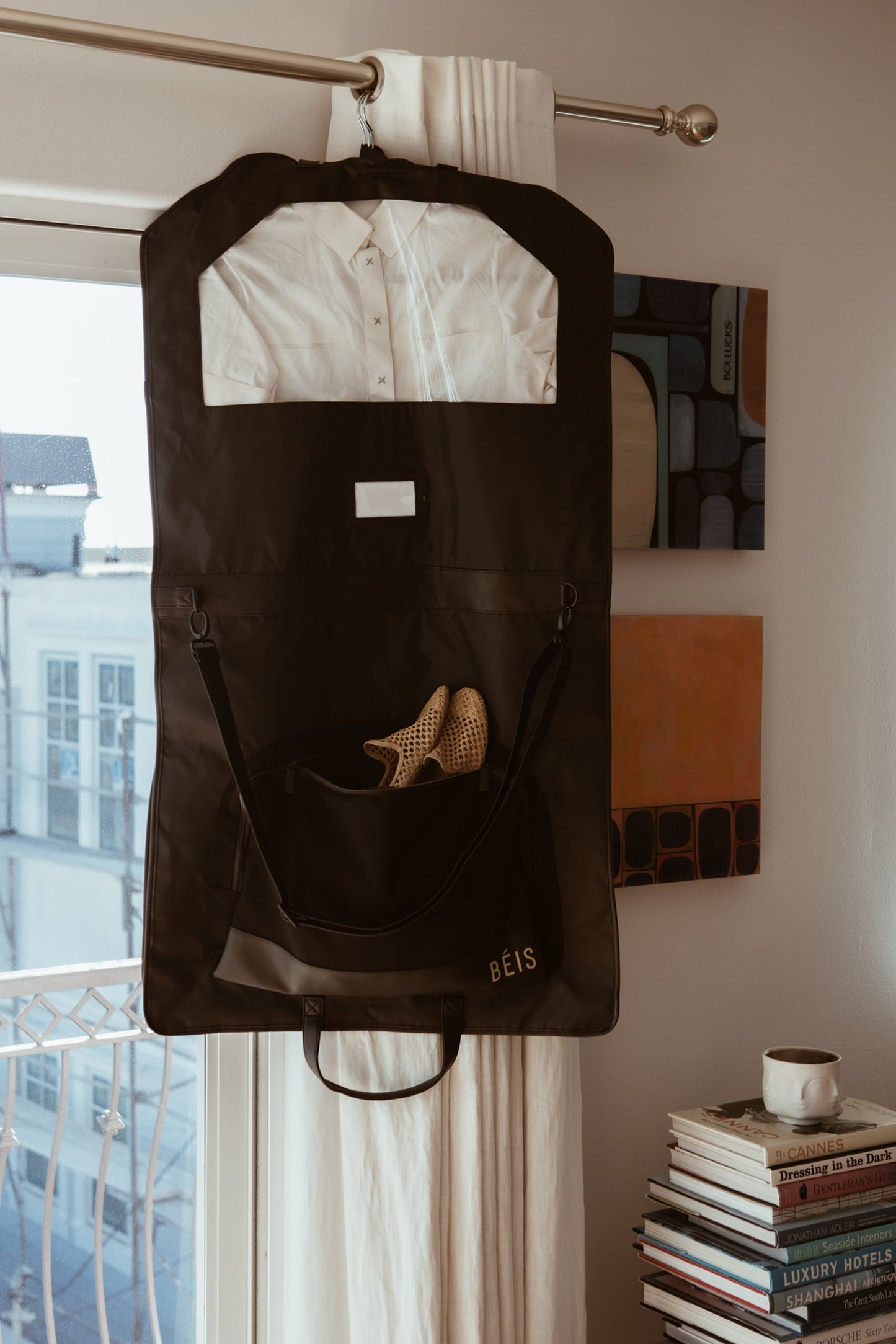 Travel Garment Bag Black Hanging on Curtain