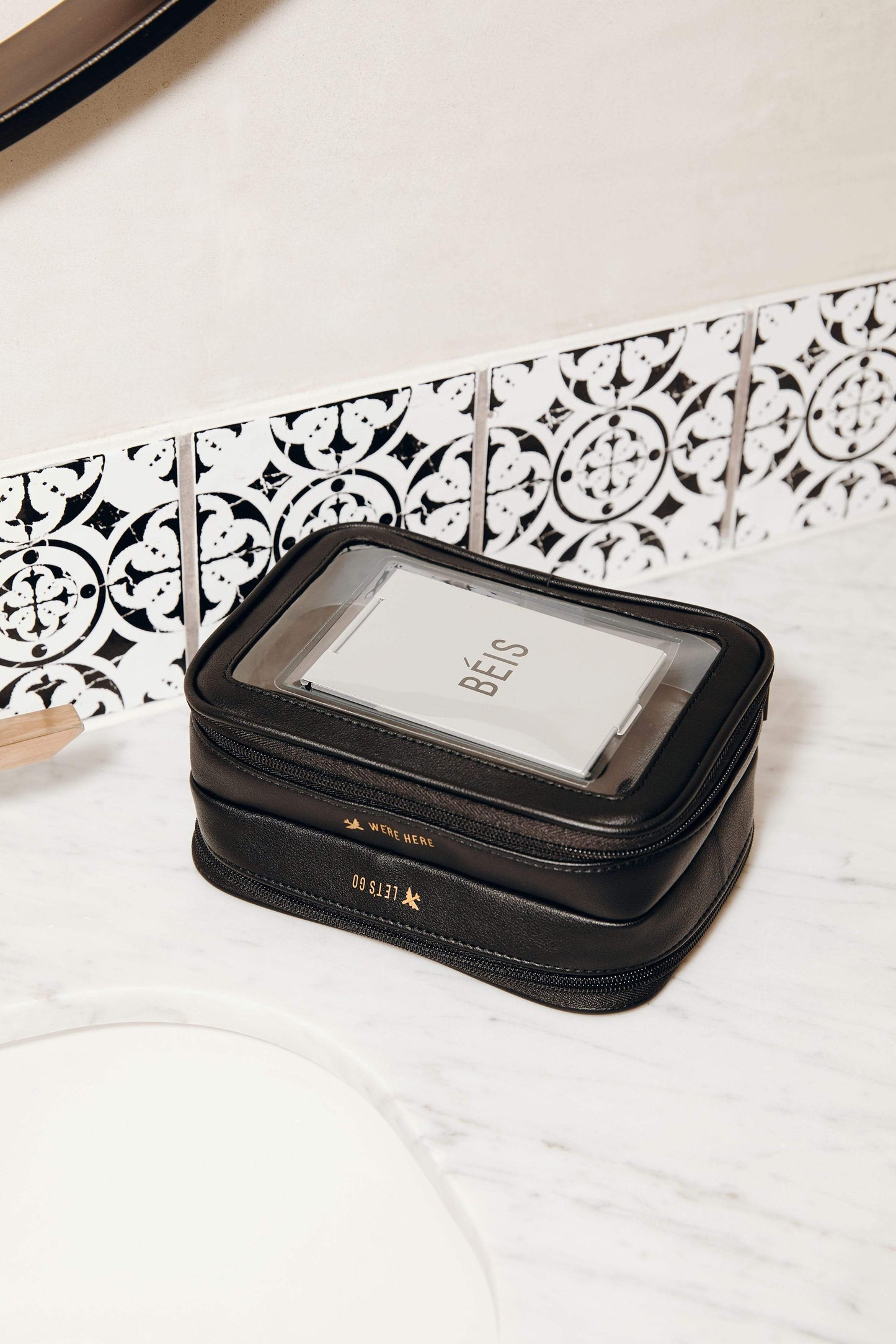 BEIS by Shay Mitchell | The On-The-Go Essential case in Black on marble countertop
