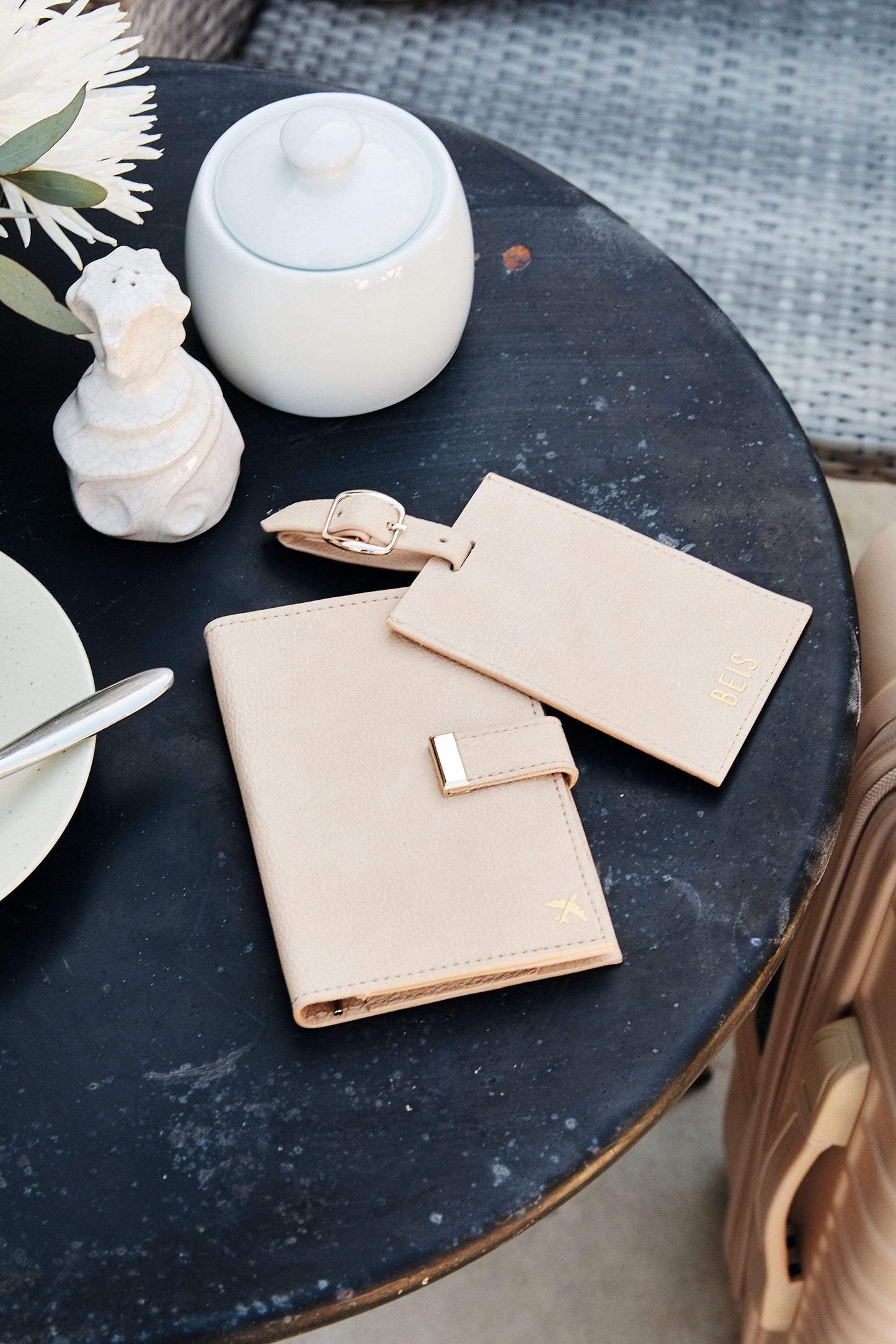BEIS by Shay Mitchell | The Passport and Luggage Tag Set on cafe table