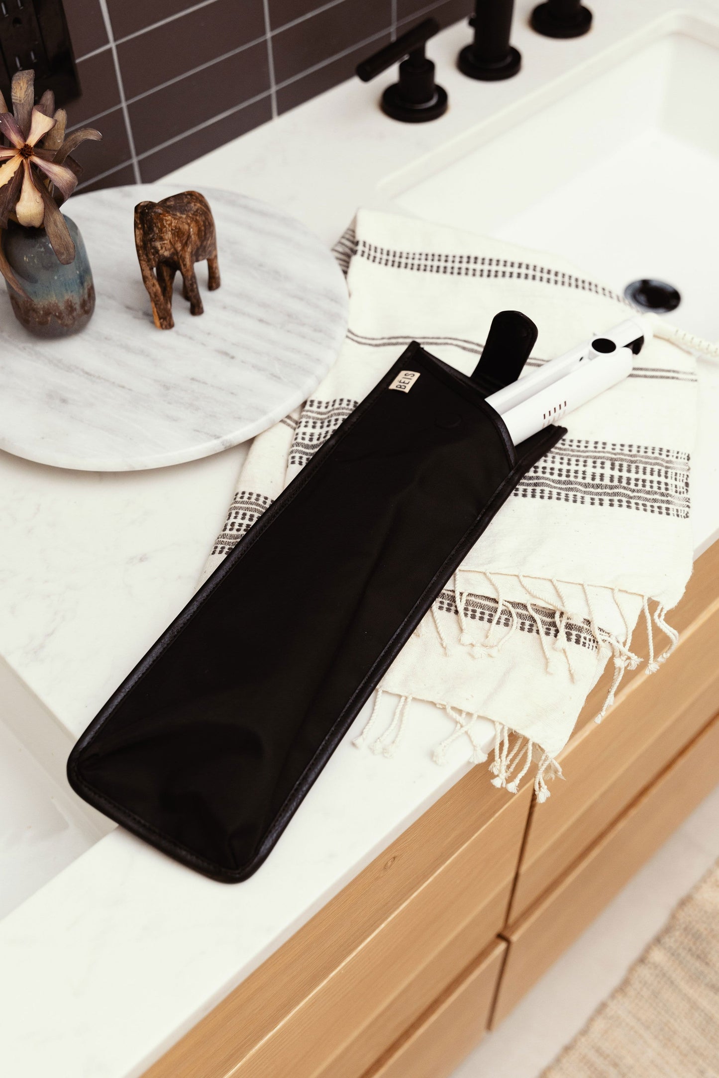 Hot Tools Cover Black Front on Bathroom Countertop